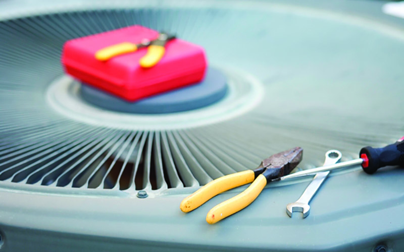 tools on top of air conditioner